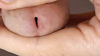 Extreme closeup of big and loud flowing ejaculation