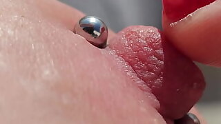 Playing Pockmarked Nipples Close Up on Balcony