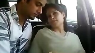 Indian couple close to railway carriage gets spoiled