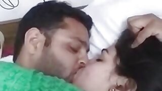 Newly married couple capturing their dealings moments